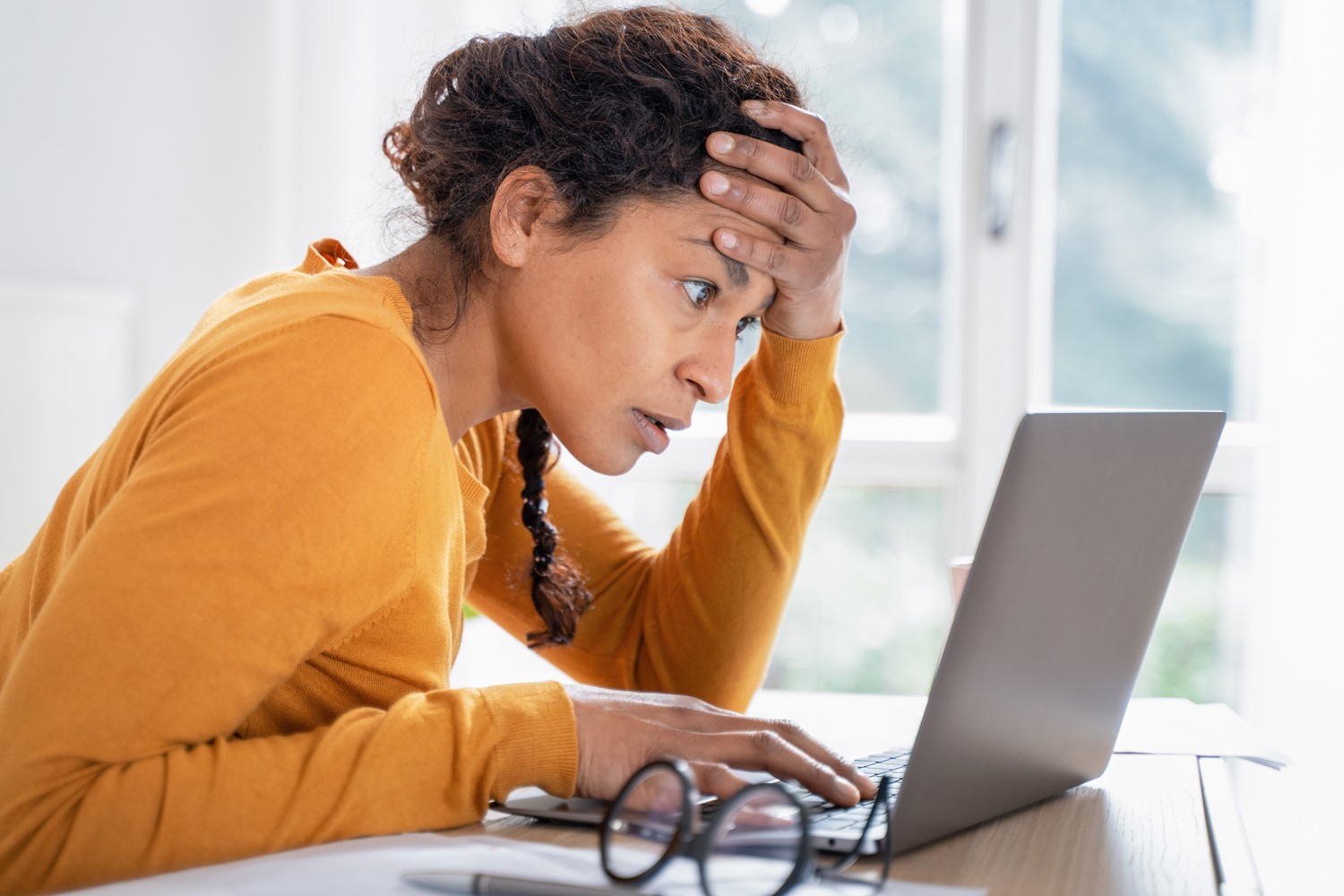 Person looking at a laptop screen