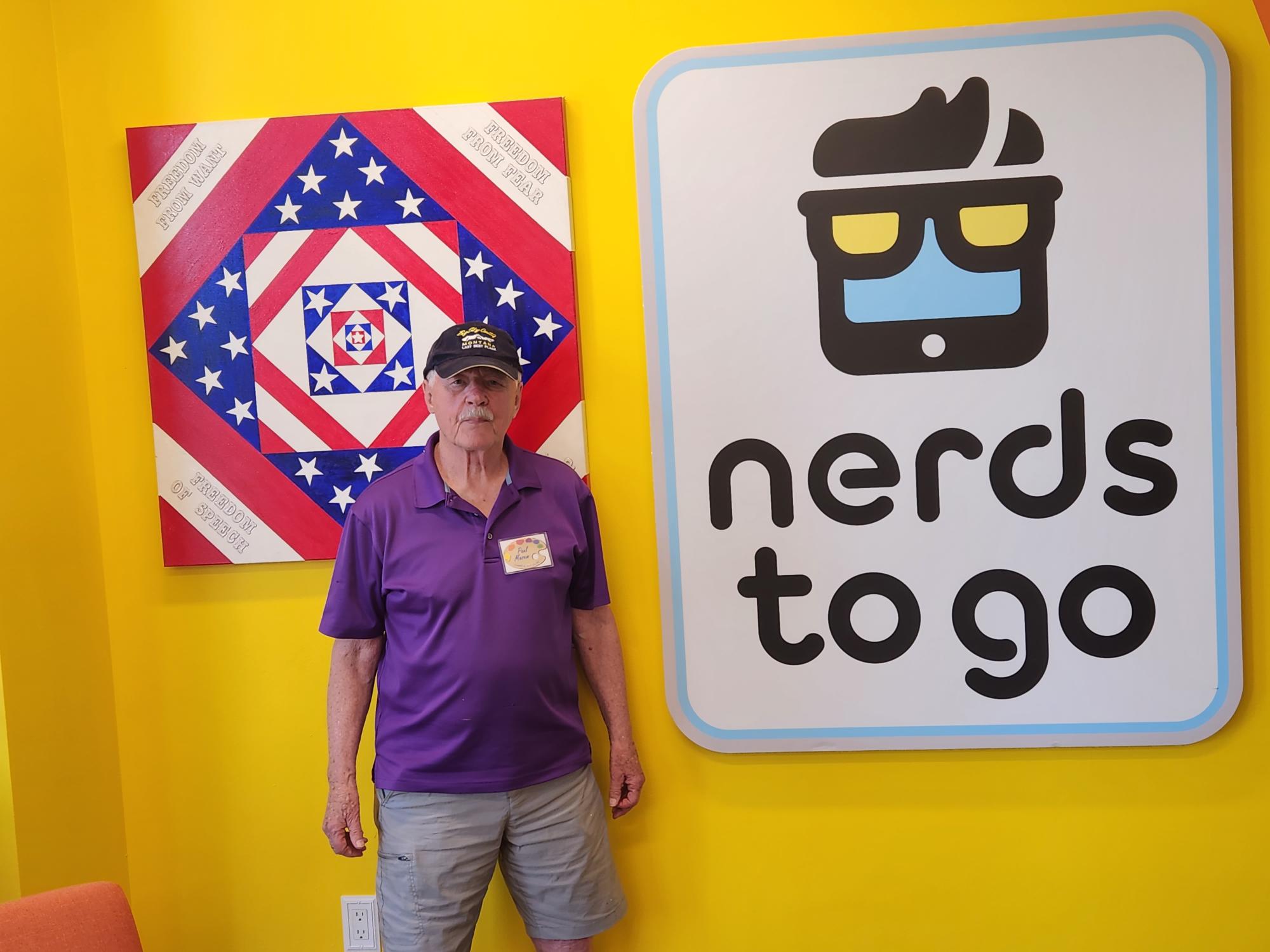 Paul Masem next to NerdsToGo logo